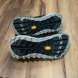 Altra lone peak 4. Women size 11. Black and light blue.